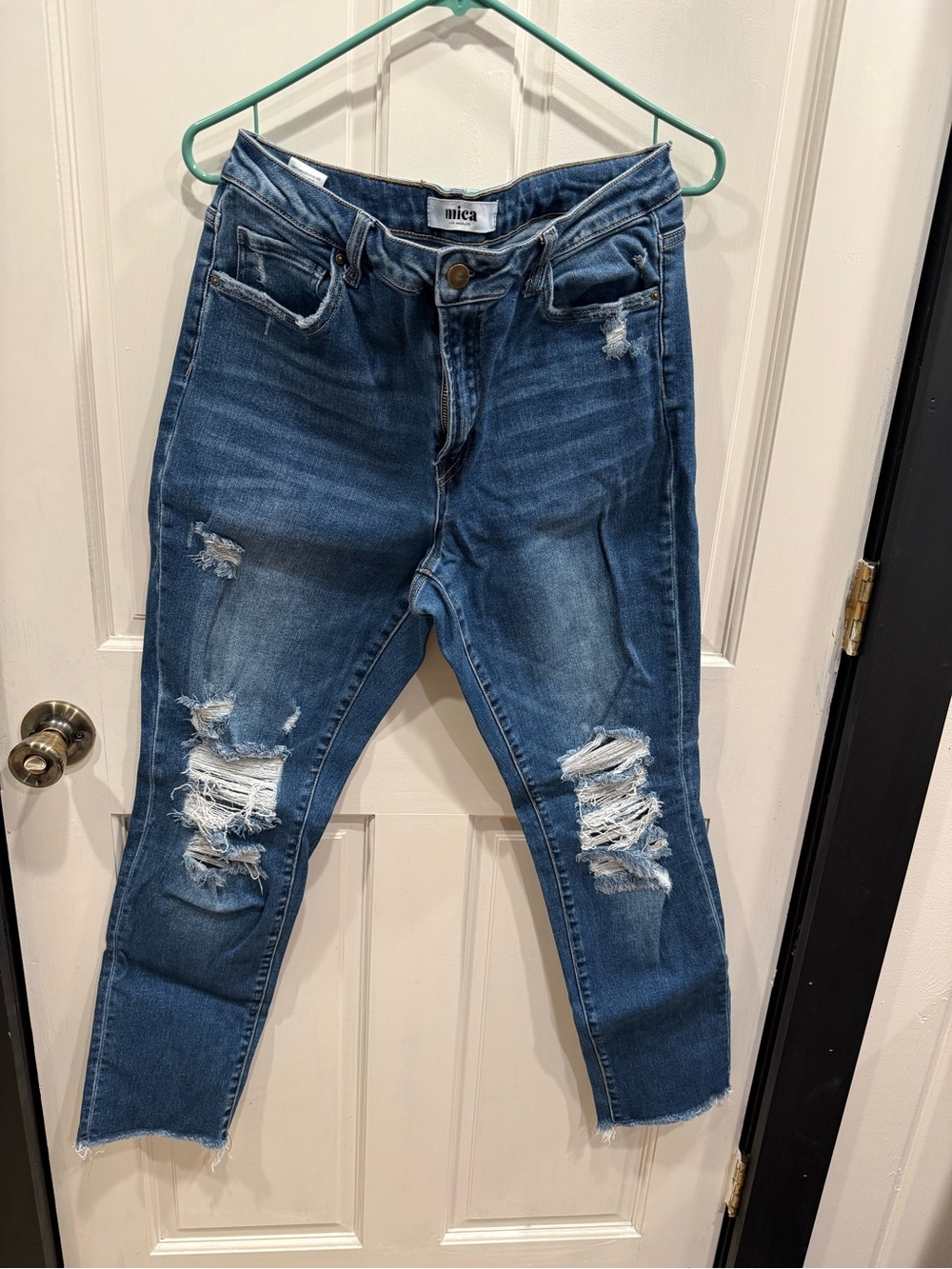 Distressed Mid-Wash Blue Women’s Jeans